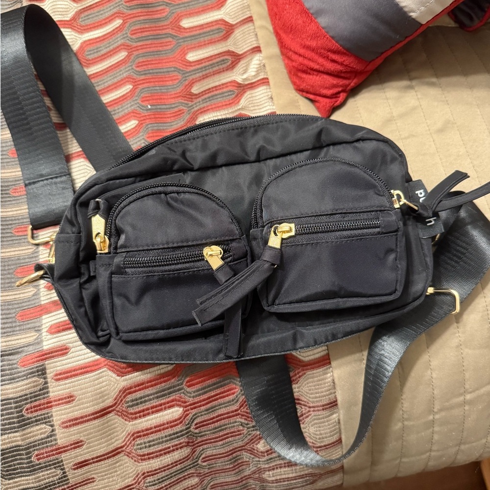 Elegant Black Crossbody Bag with Gold Accents